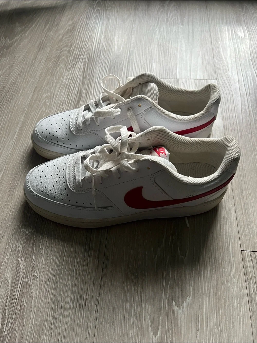 Nike Kids White Sneakers with Red Swoosh